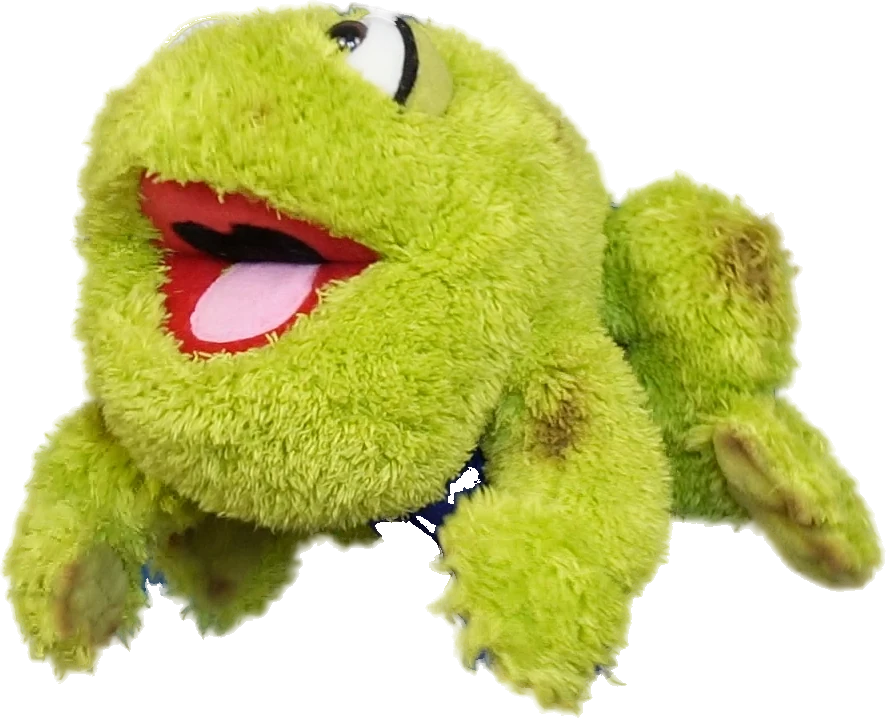 O fantoche Sapo Samba, um sapo verde e peludo, sorrindo
